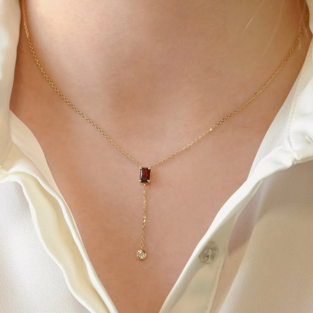 Novena Necklace in Diamond and Garnet